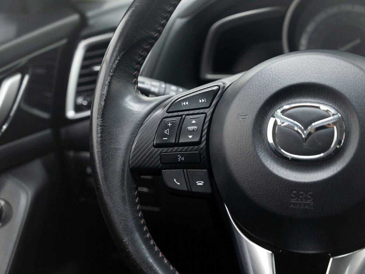 Mazda 3 с пробегом — 2013 год. Фото: #14