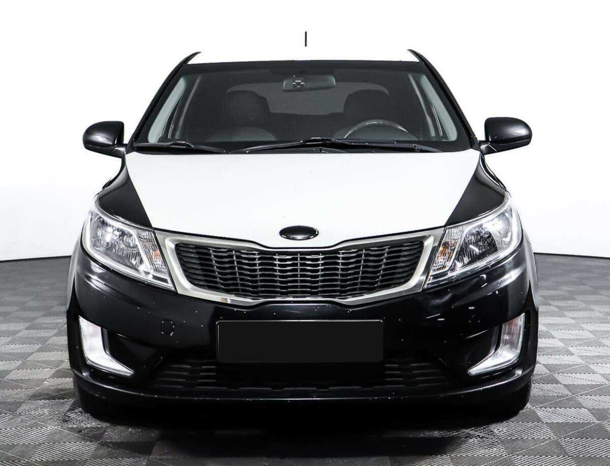 Kia Rio с пробегом — 2013 год. Фото: #1