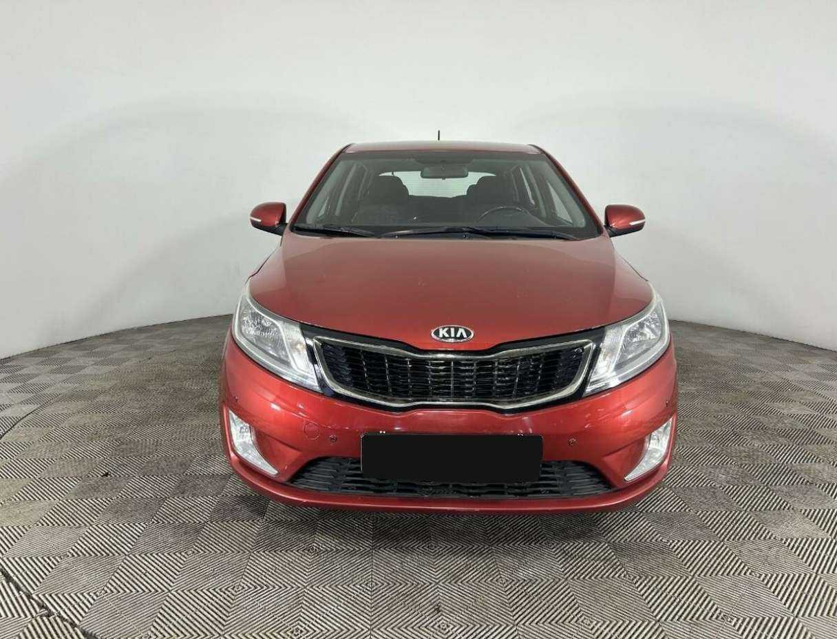 Kia Rio с пробегом — 2013 год. Фото: #1