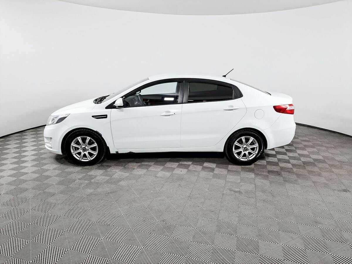 Kia Rio с пробегом — 2013 год. Фото: #7
