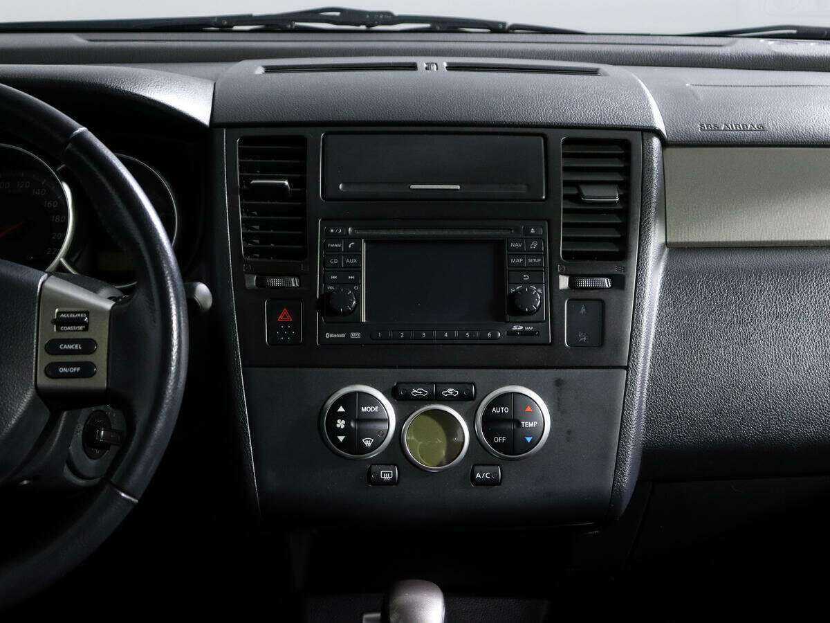 Nissan Tiida с пробегом — 2012 год. Фото: #12