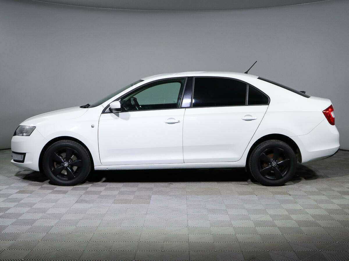Skoda Rapid с пробегом — 2014 год. Фото: #6
