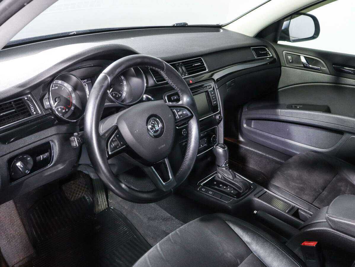 Skoda Superb с пробегом — 2013 год. Фото: #13