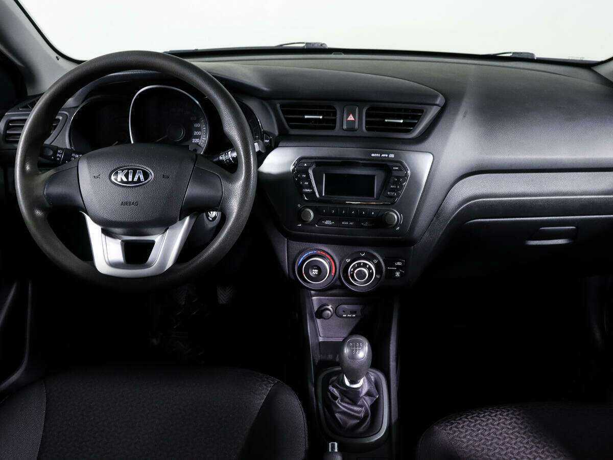 Kia Rio с пробегом — 2013 год. Фото: #10