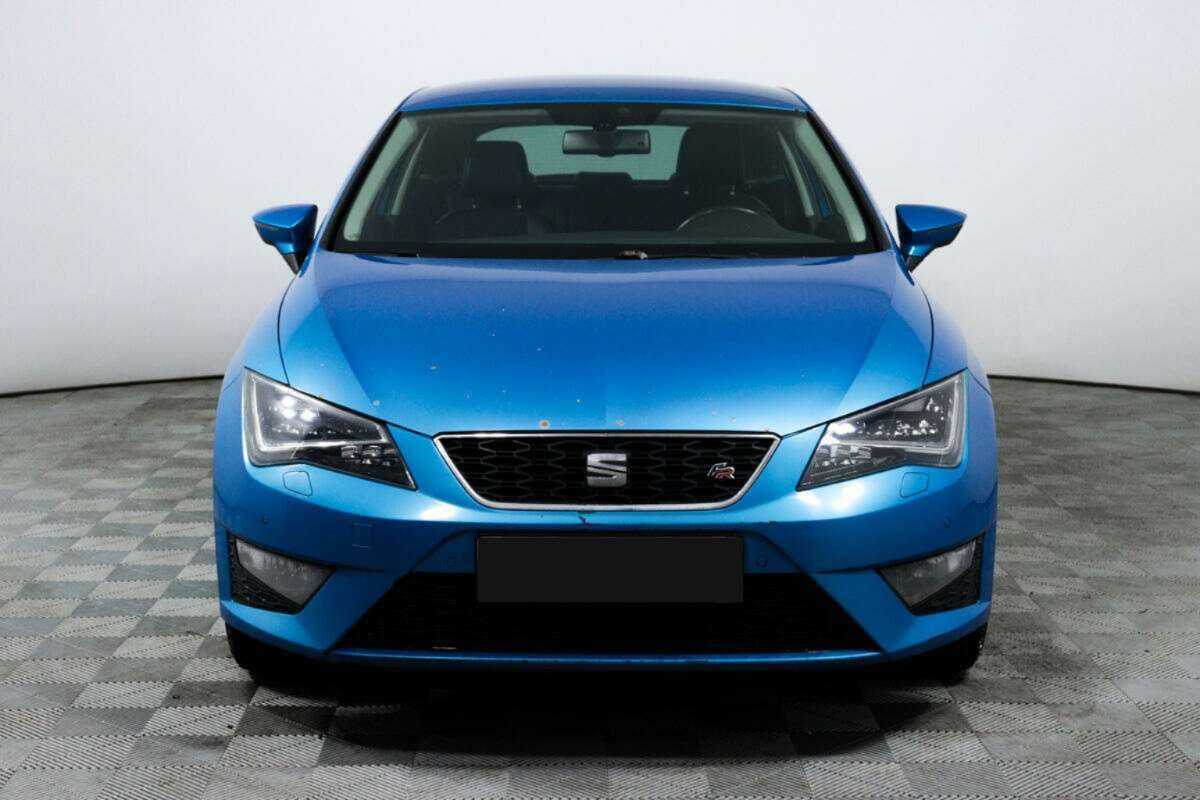SEAT Leon с пробегом — 2013 год. Фото: #1