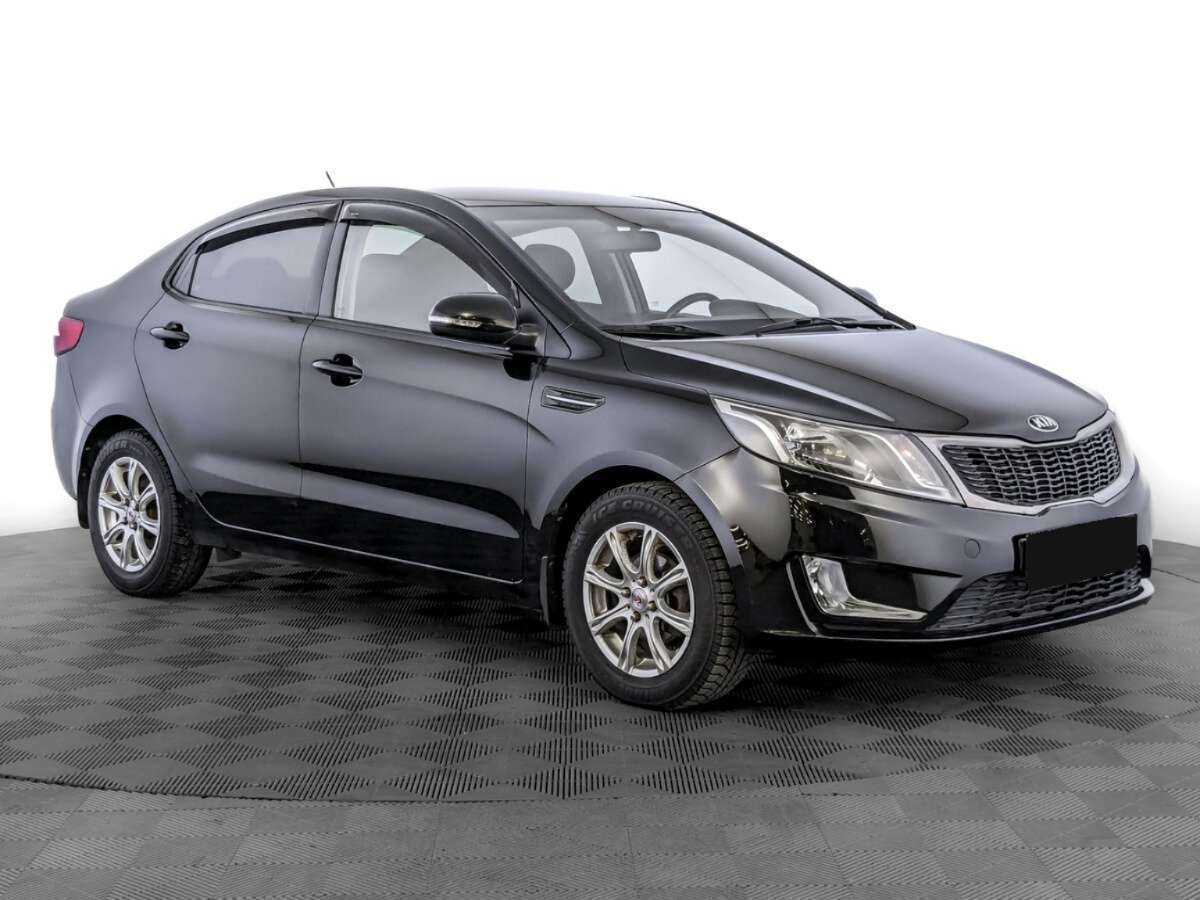 Kia Rio с пробегом — 2014 год. Фото: #2
