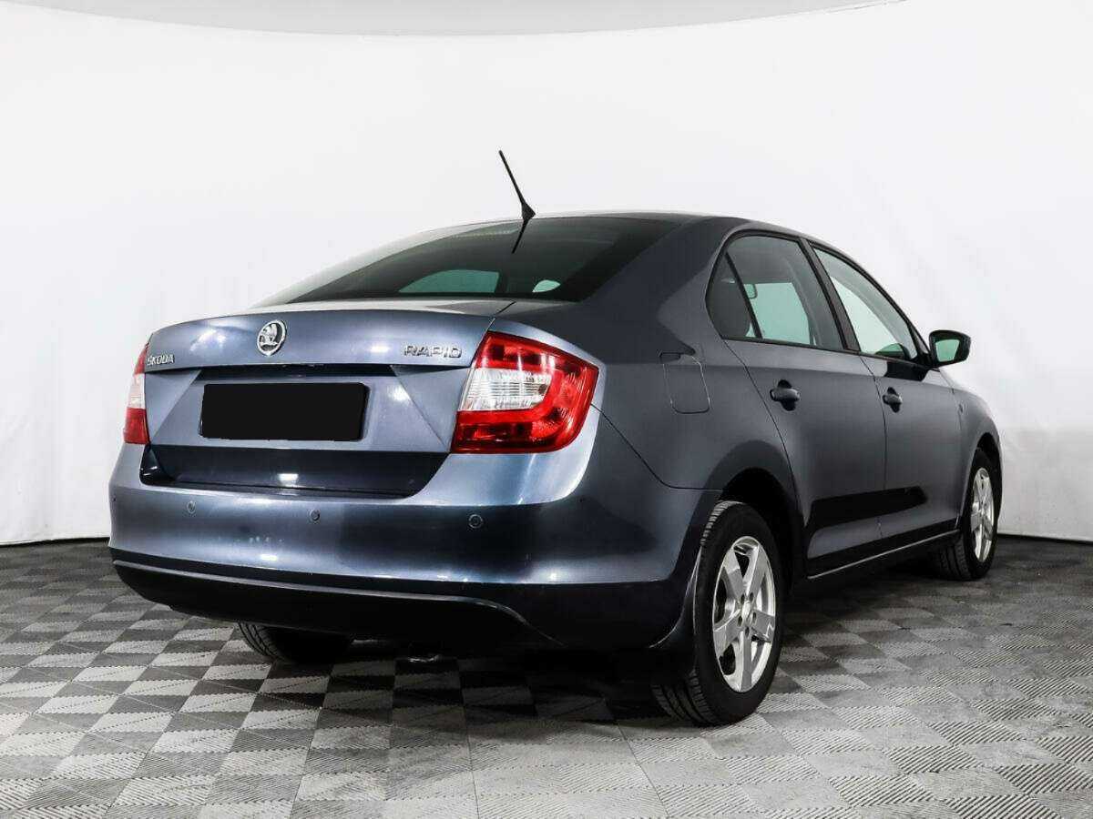 Skoda Rapid с пробегом — 2014 год. Фото: #3