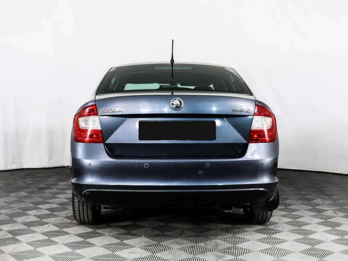 Skoda Rapid с пробегом — 2014 год. Фото: #4
