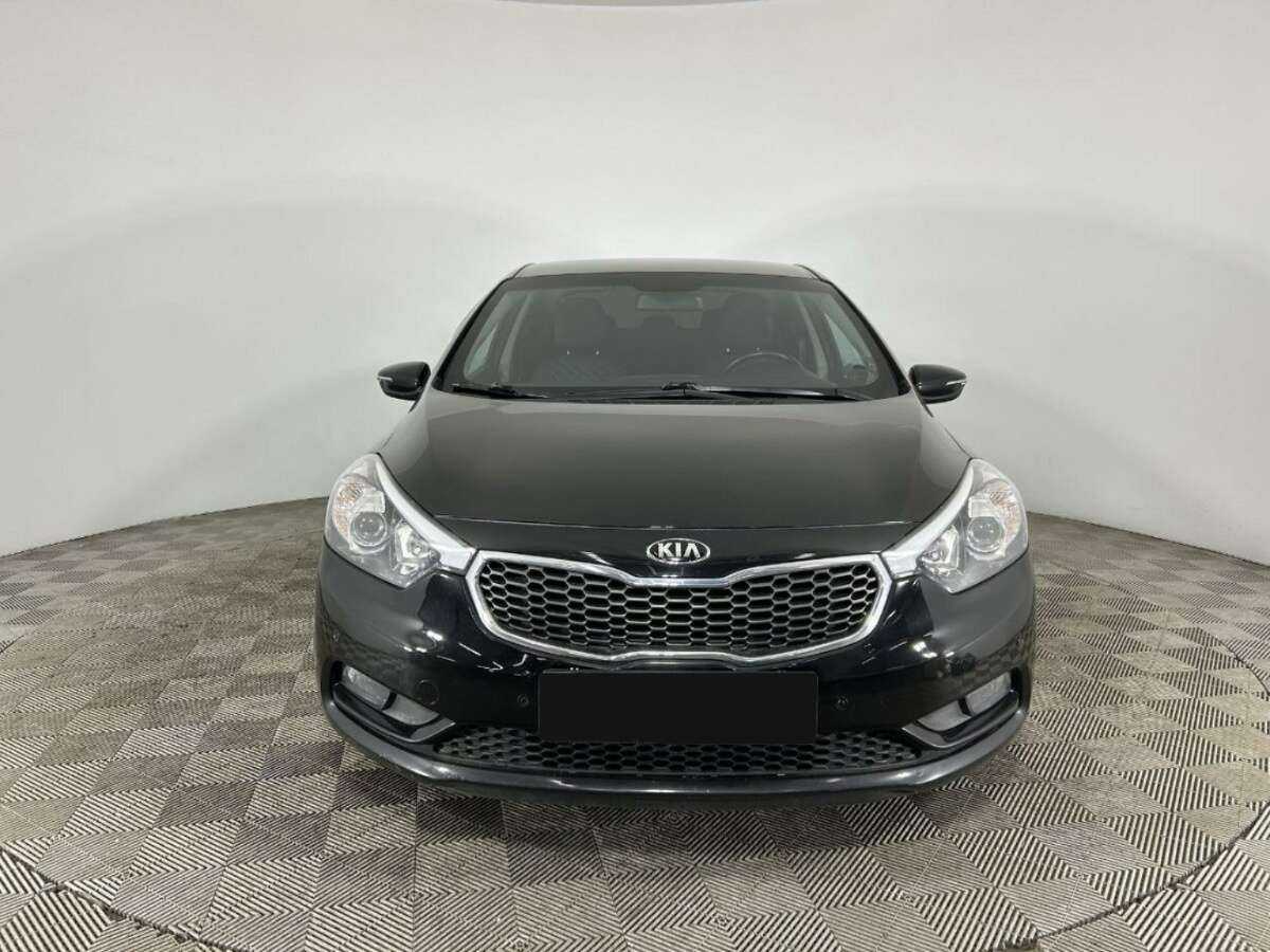 Kia Cerato с пробегом — 2014 год. Фото: #1