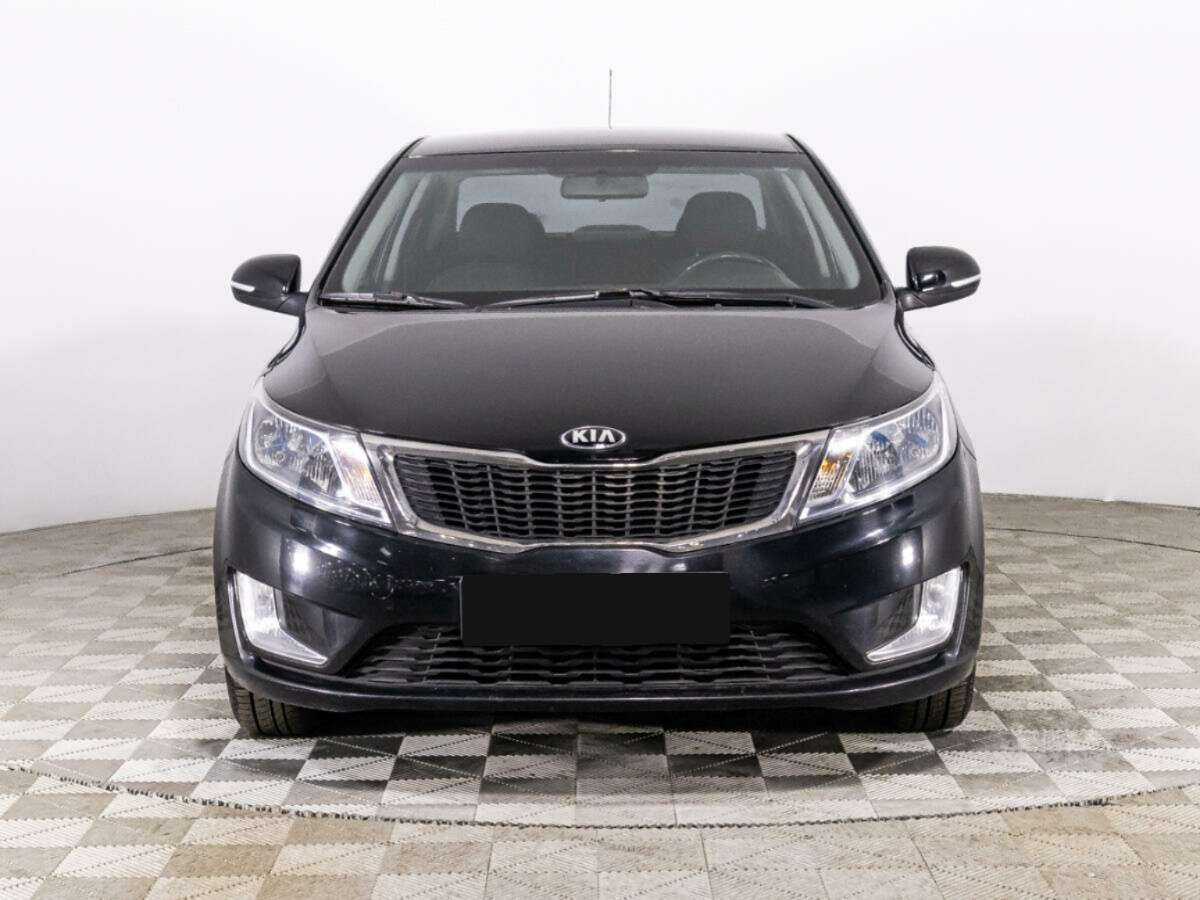 Kia Rio с пробегом — 2014 год. Фото: #1