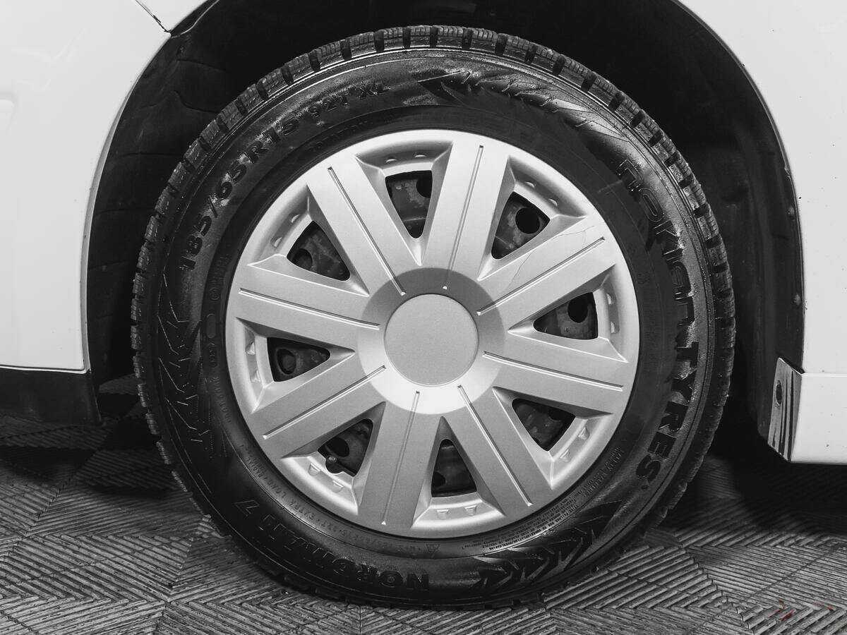 Nissan Tiida с пробегом — 2013 год. Фото: #14