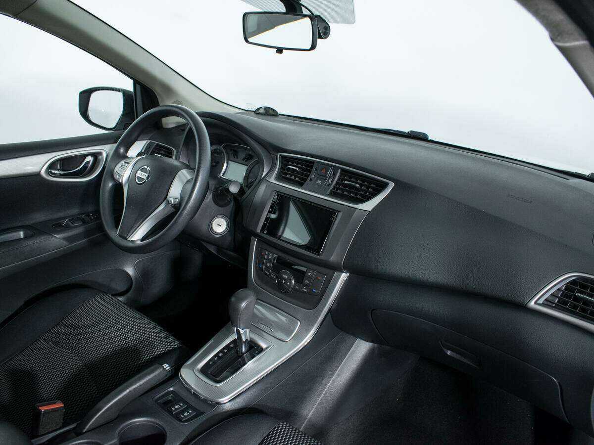 Nissan Tiida с пробегом — 2015 год. Фото: #8