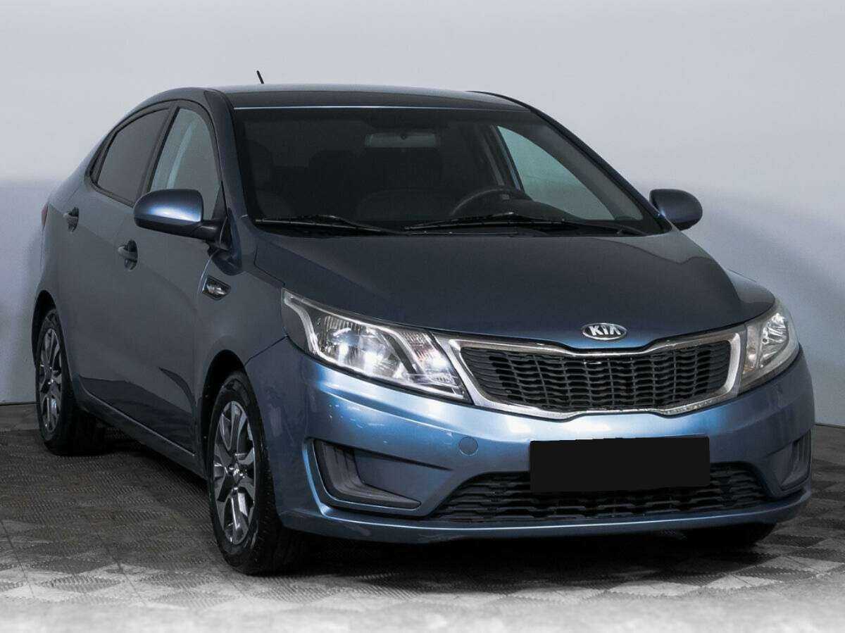 Kia Rio с пробегом — 2013 год. Фото: #2