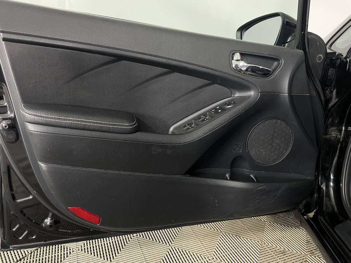 Kia Cerato с пробегом — 2015 год. Фото: #18