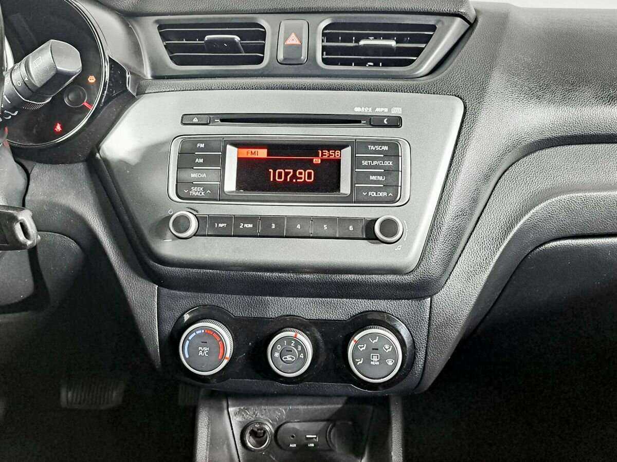 Kia Rio с пробегом — 2015 год. Фото: #11
