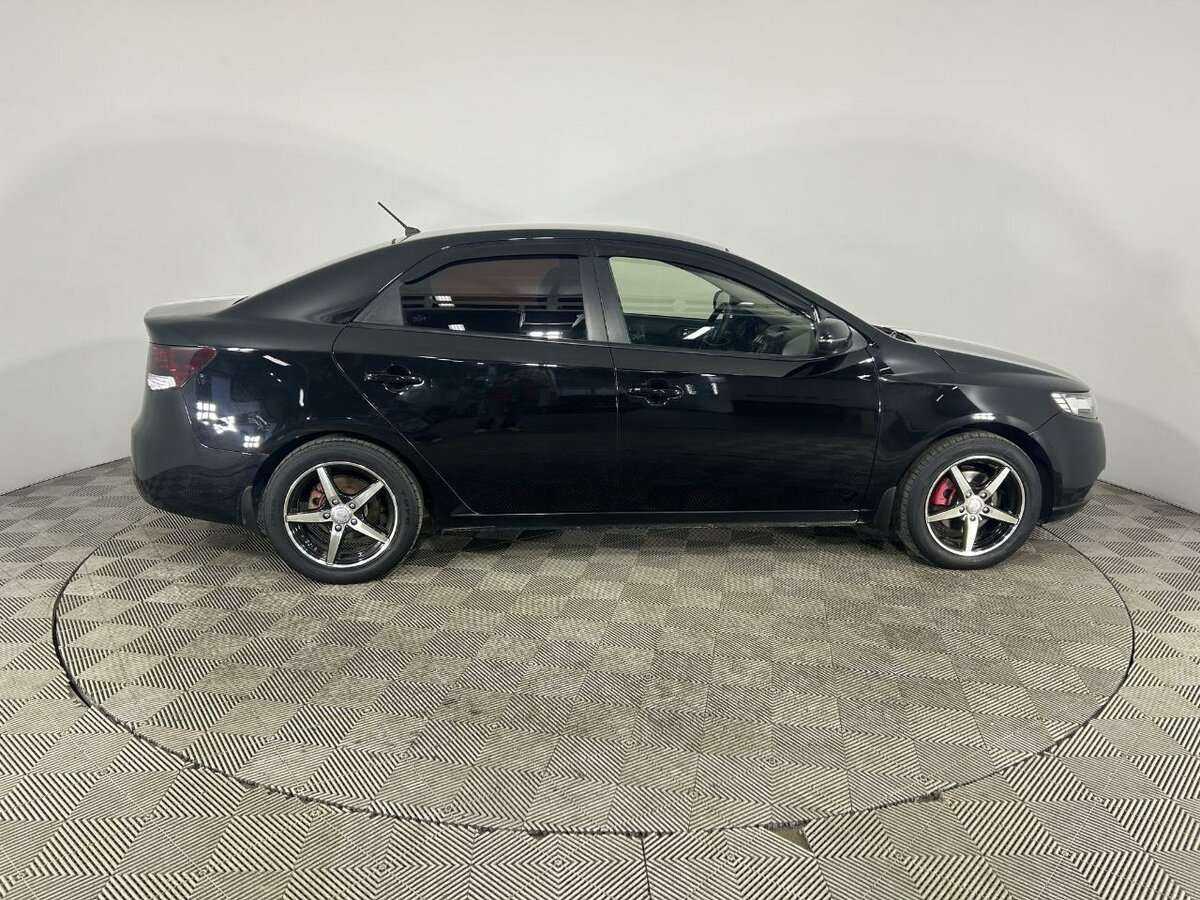 Kia Cerato с пробегом — 2013 год. Фото: #2