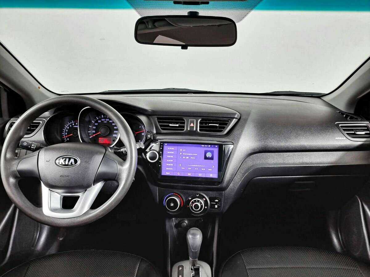 Kia Rio с пробегом — 2013 год. Фото: #11
