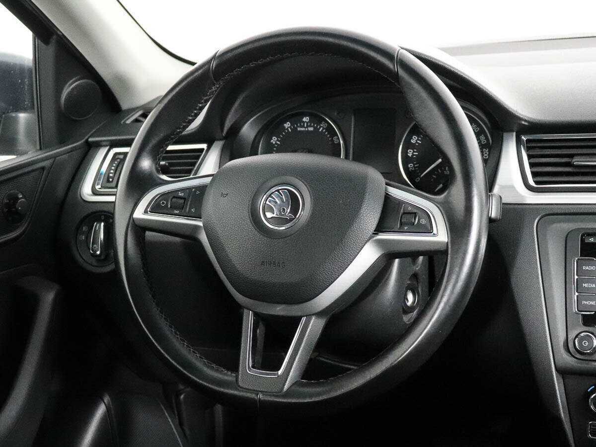 Skoda Rapid с пробегом — 2014 год. Фото: #12
