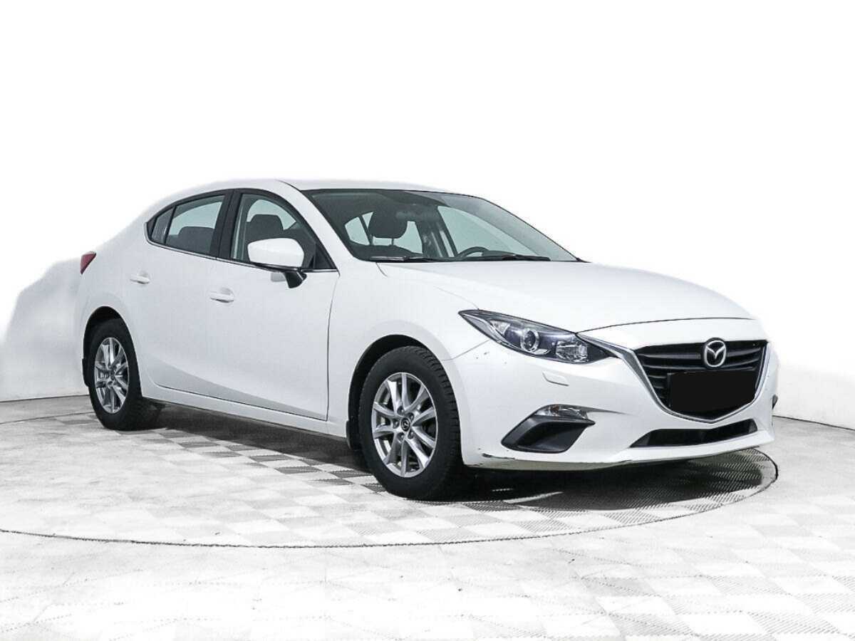 Mazda 3 с пробегом — 2014 год. Фото: #2