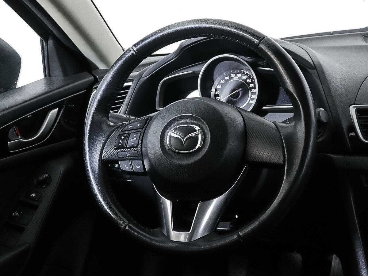 Mazda 3 с пробегом — 2014 год. Фото: #13