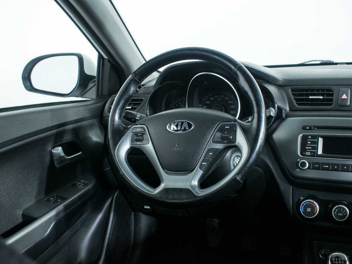 Kia Rio с пробегом — 2015 год. Фото: #13