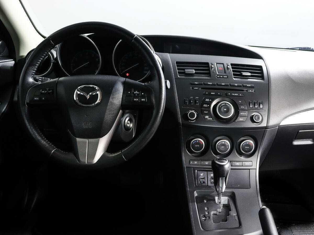Mazda 3 с пробегом — 2013 год. Фото: #11