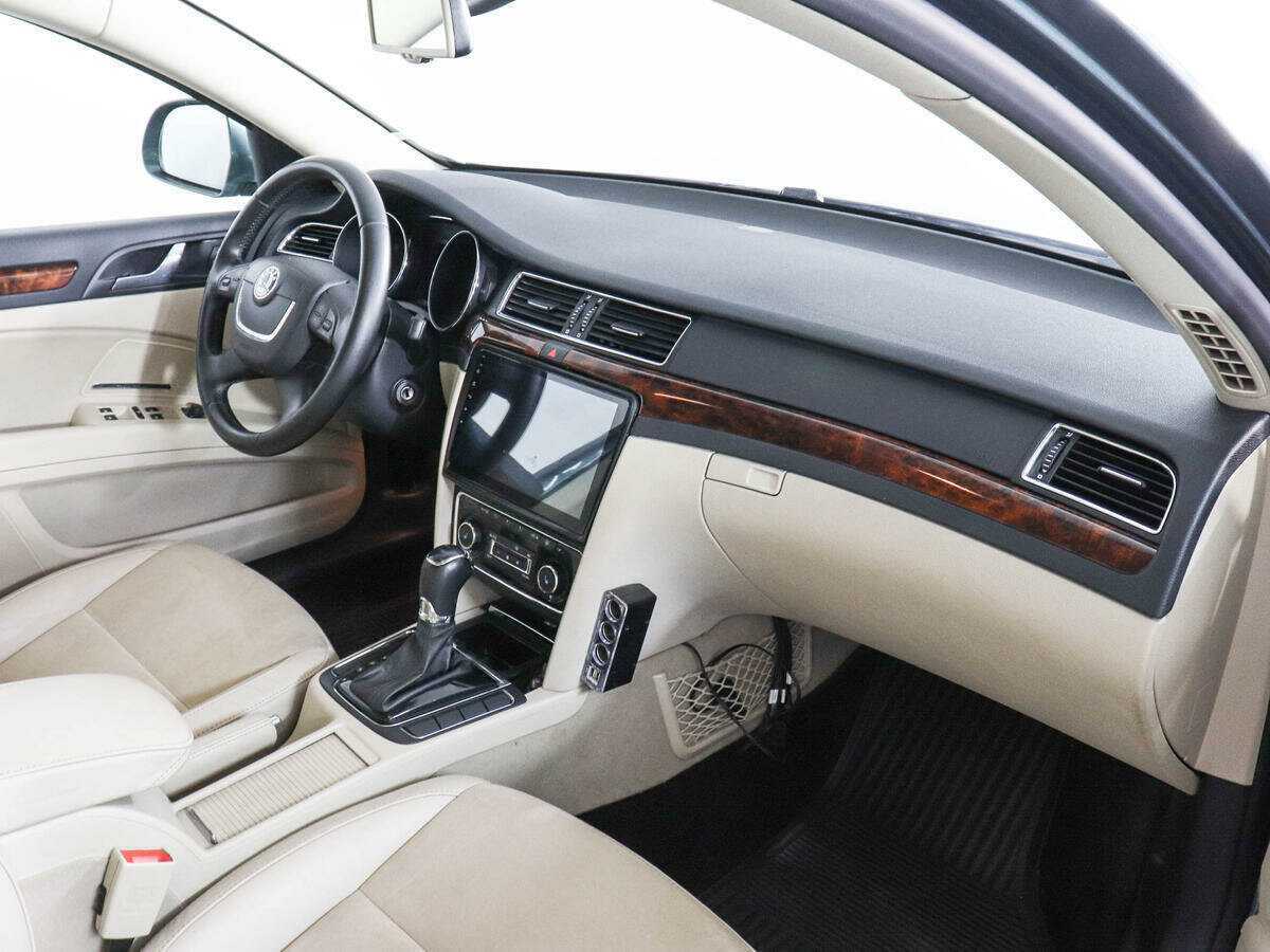 Skoda Superb с пробегом — 2012 год. Фото: #9