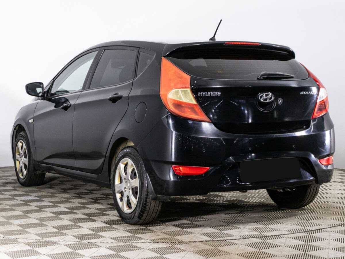 Hyundai Solaris с пробегом — 2012 год. Фото: #6