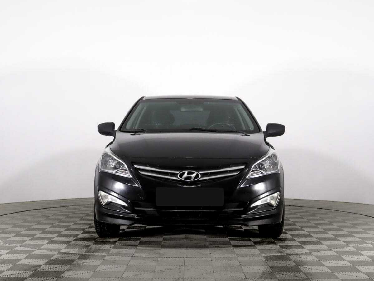 Hyundai Solaris с пробегом — 2014 год. Фото: #1