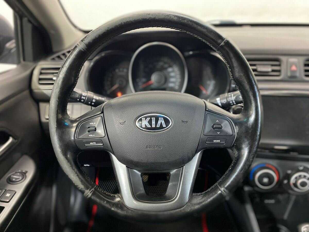 Kia Rio с пробегом — 2014 год. Фото: #11