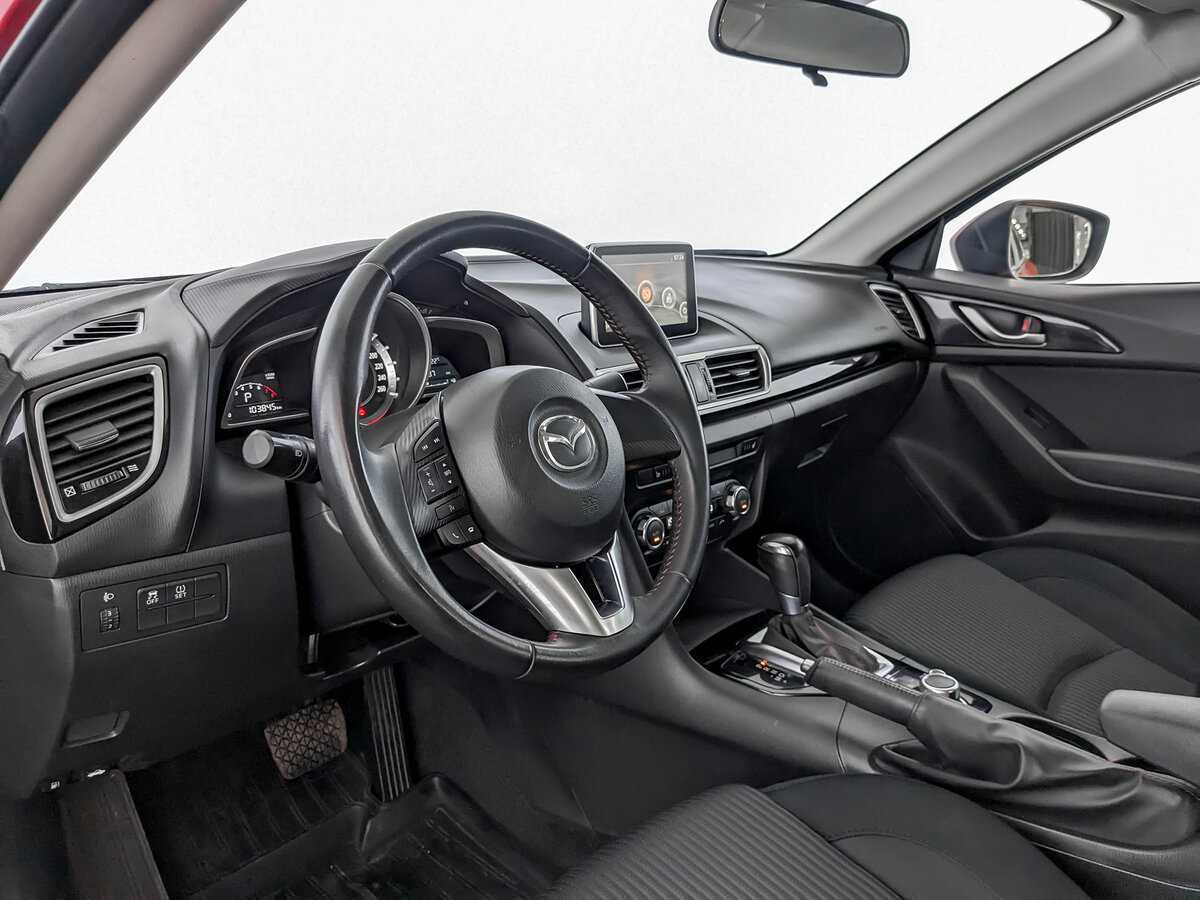 Mazda 3 с пробегом — 2015 год. Фото: #13