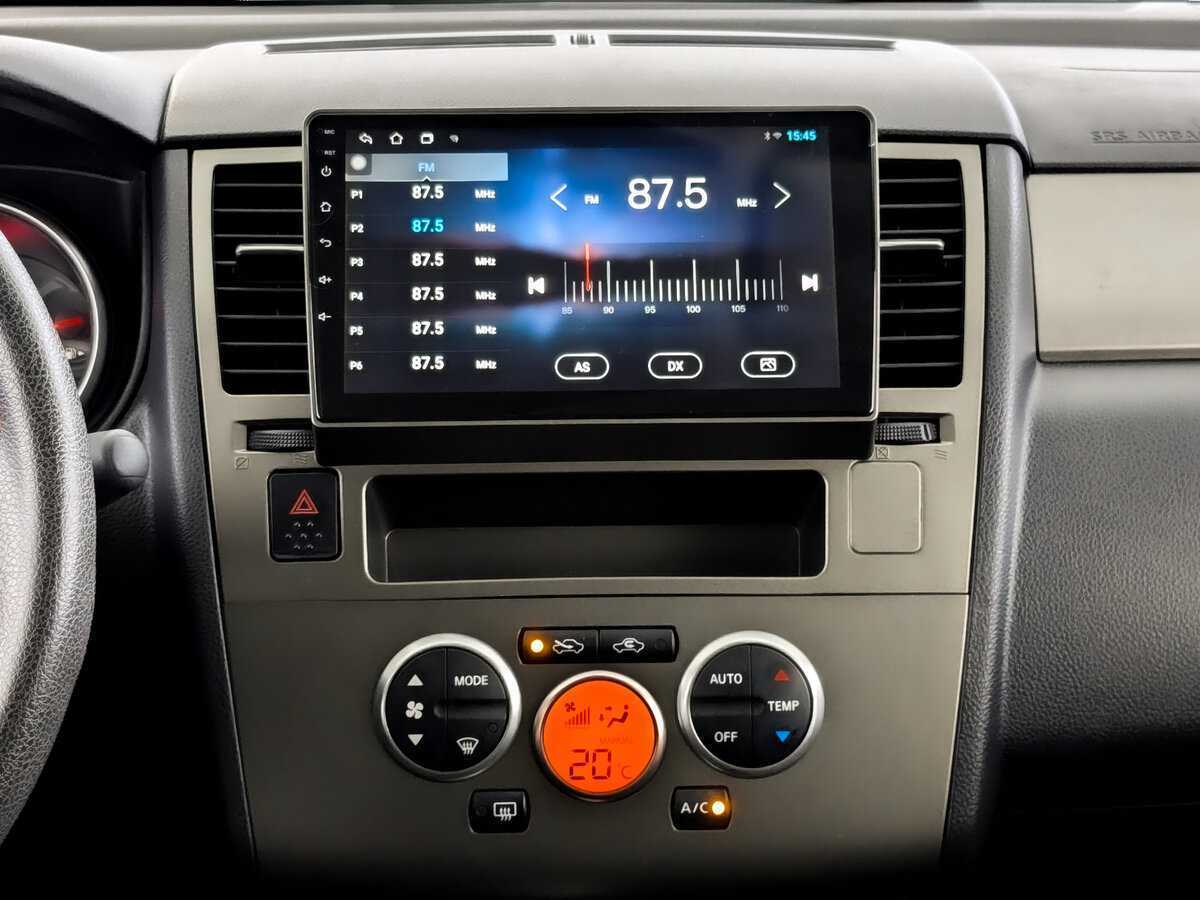 Nissan Tiida с пробегом — 2013 год. Фото: #12