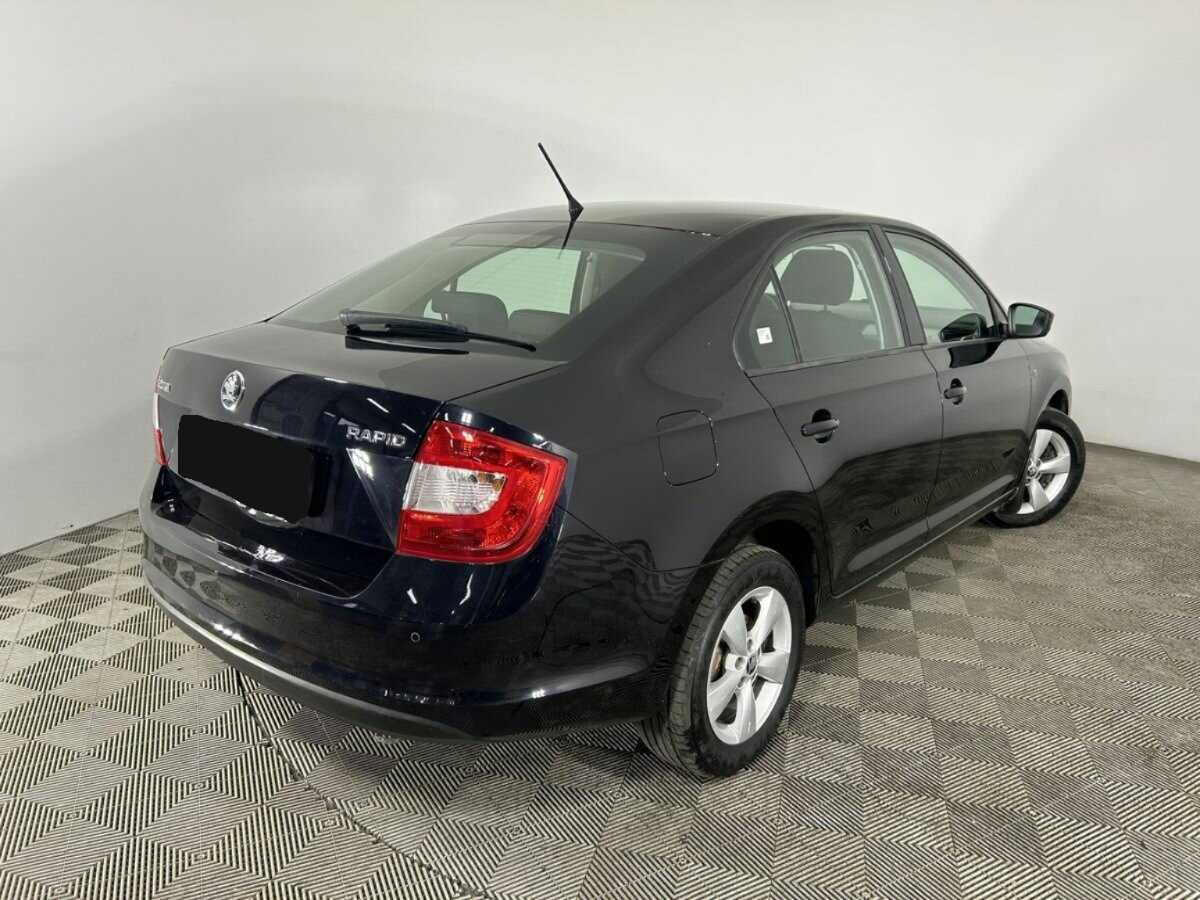 Skoda Rapid с пробегом — 2014 год. Фото: #5