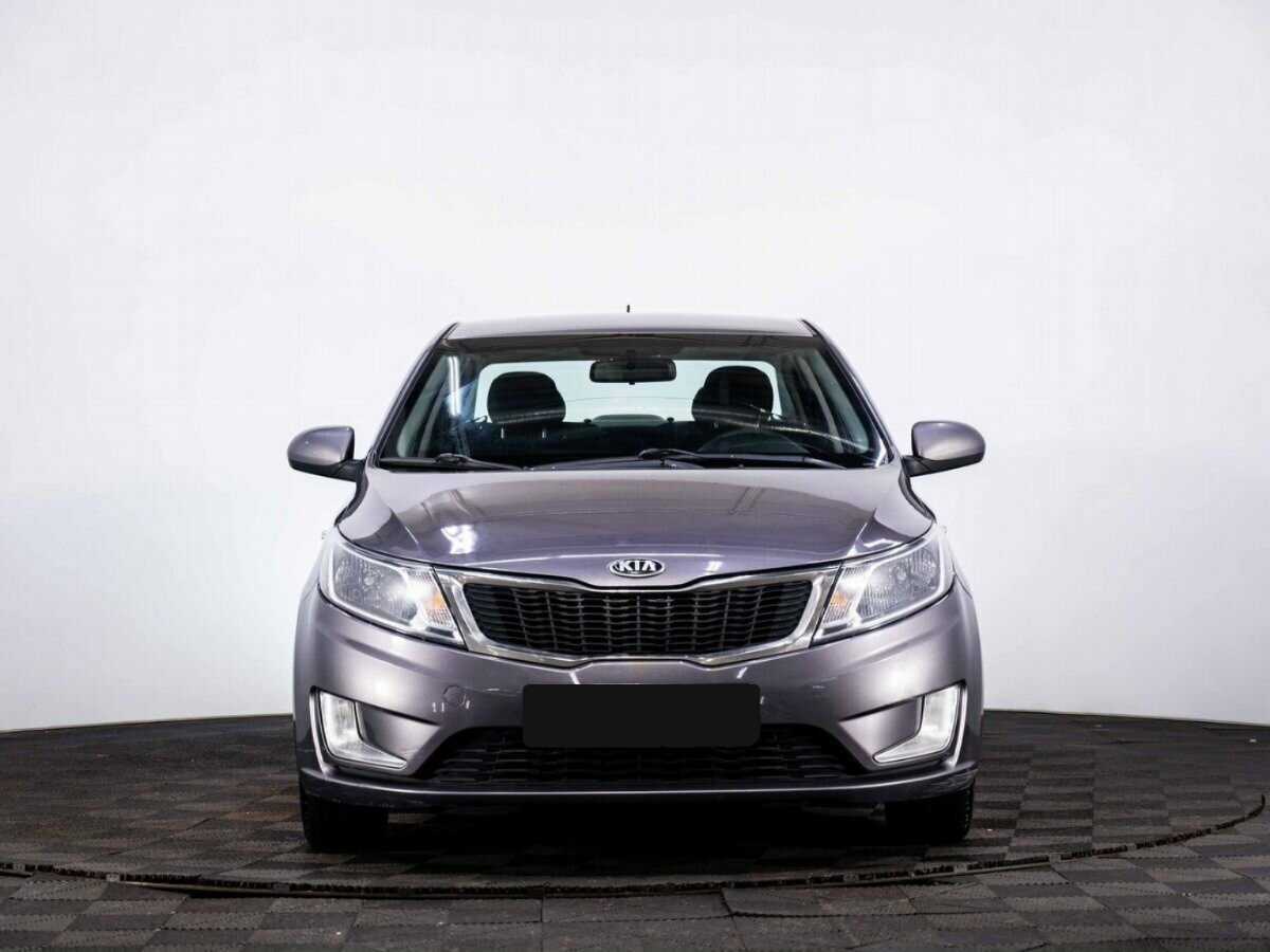 Kia Rio с пробегом — 2014 год. Фото: #1
