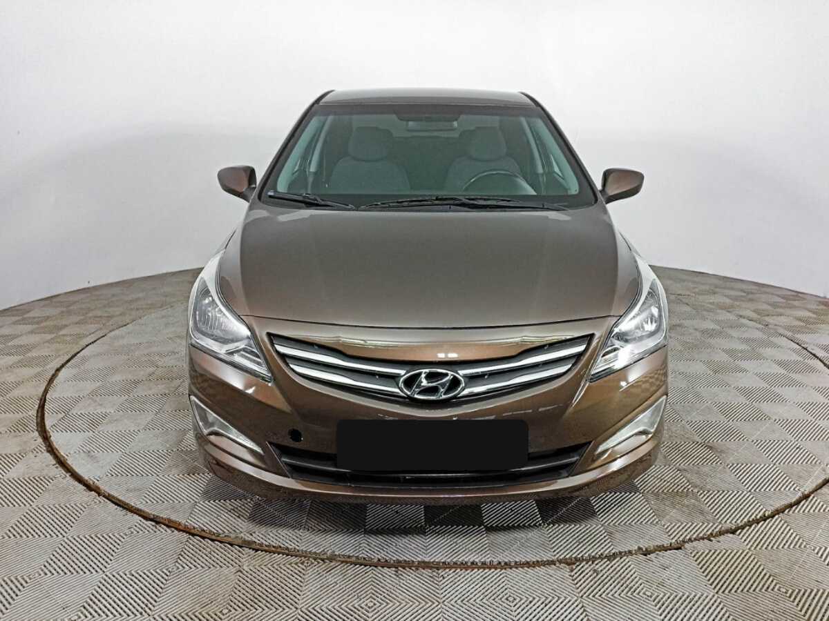 Hyundai Solaris с пробегом — 2015 год. Фото: #1