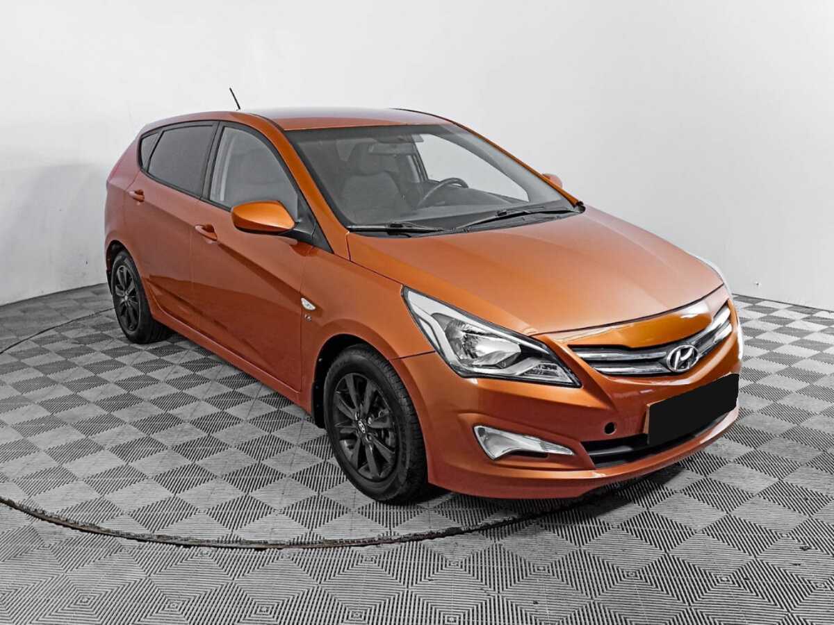 Hyundai Solaris с пробегом — 2014 год. Фото: #2