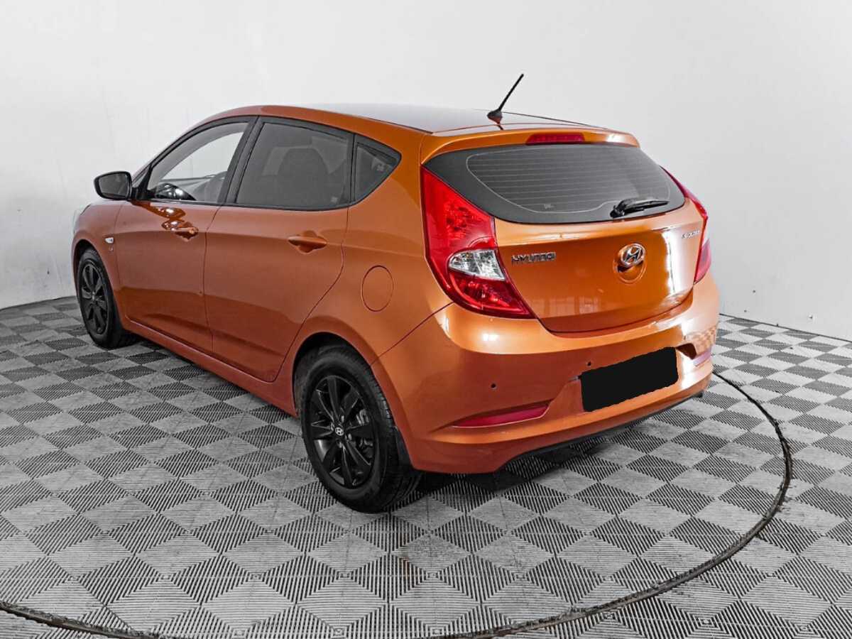 Hyundai Solaris с пробегом — 2014 год. Фото: #6