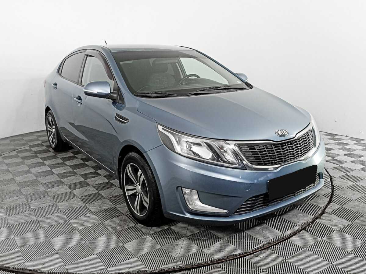 Kia Rio с пробегом — 2013 год. Фото: #2