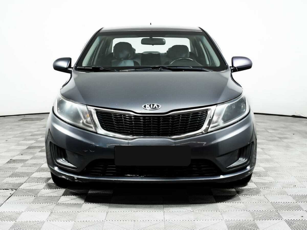 Kia Rio с пробегом — 2014 год. Фото: #1