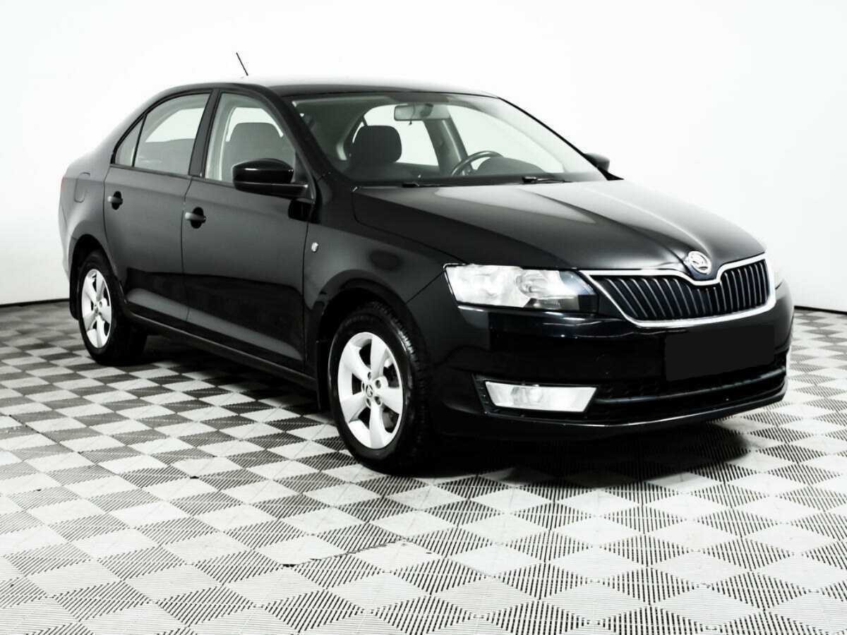 Skoda Rapid с пробегом — 2014 год. Фото: #2