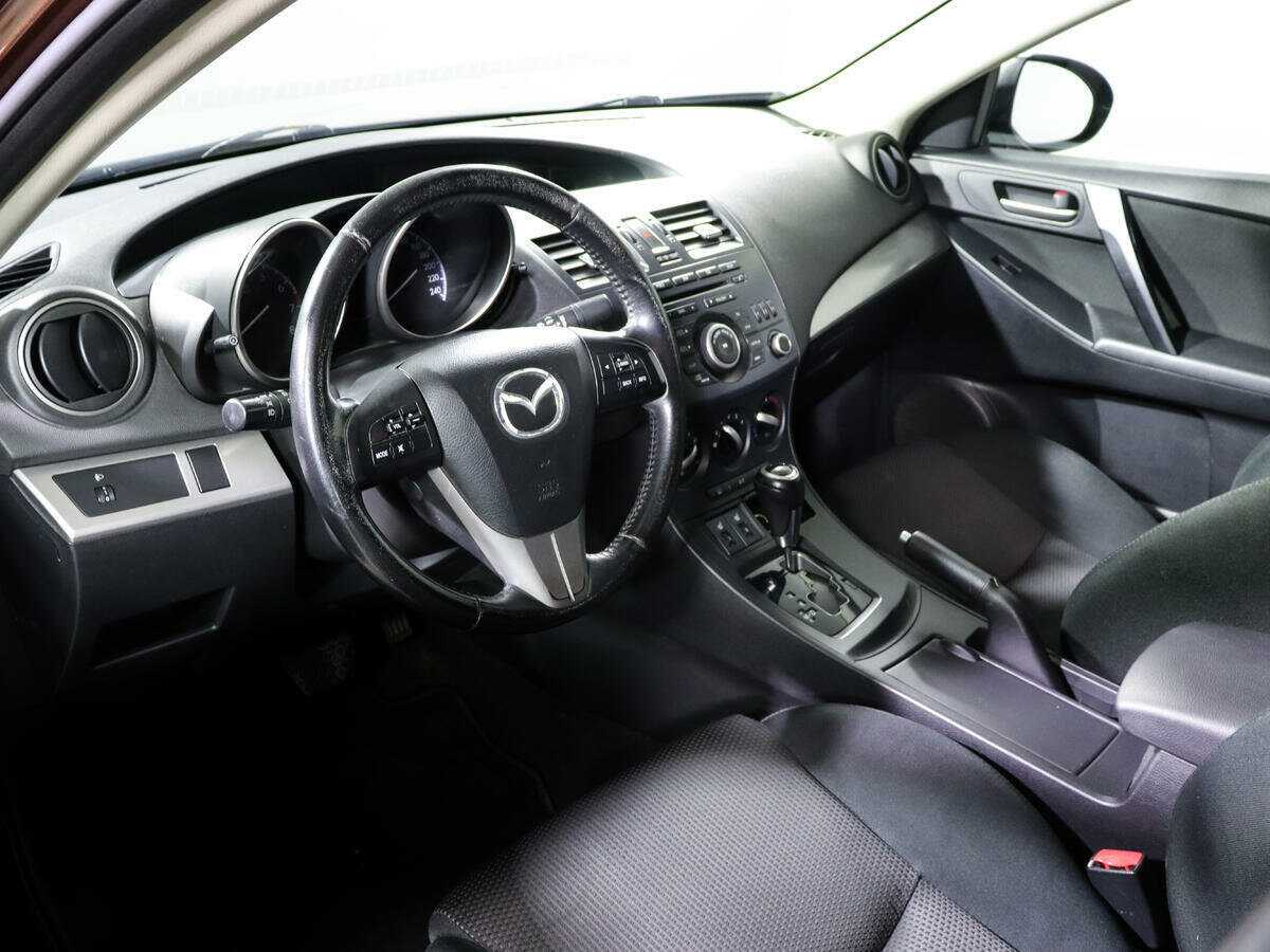 Mazda 3 с пробегом — 2012 год. Фото: #11