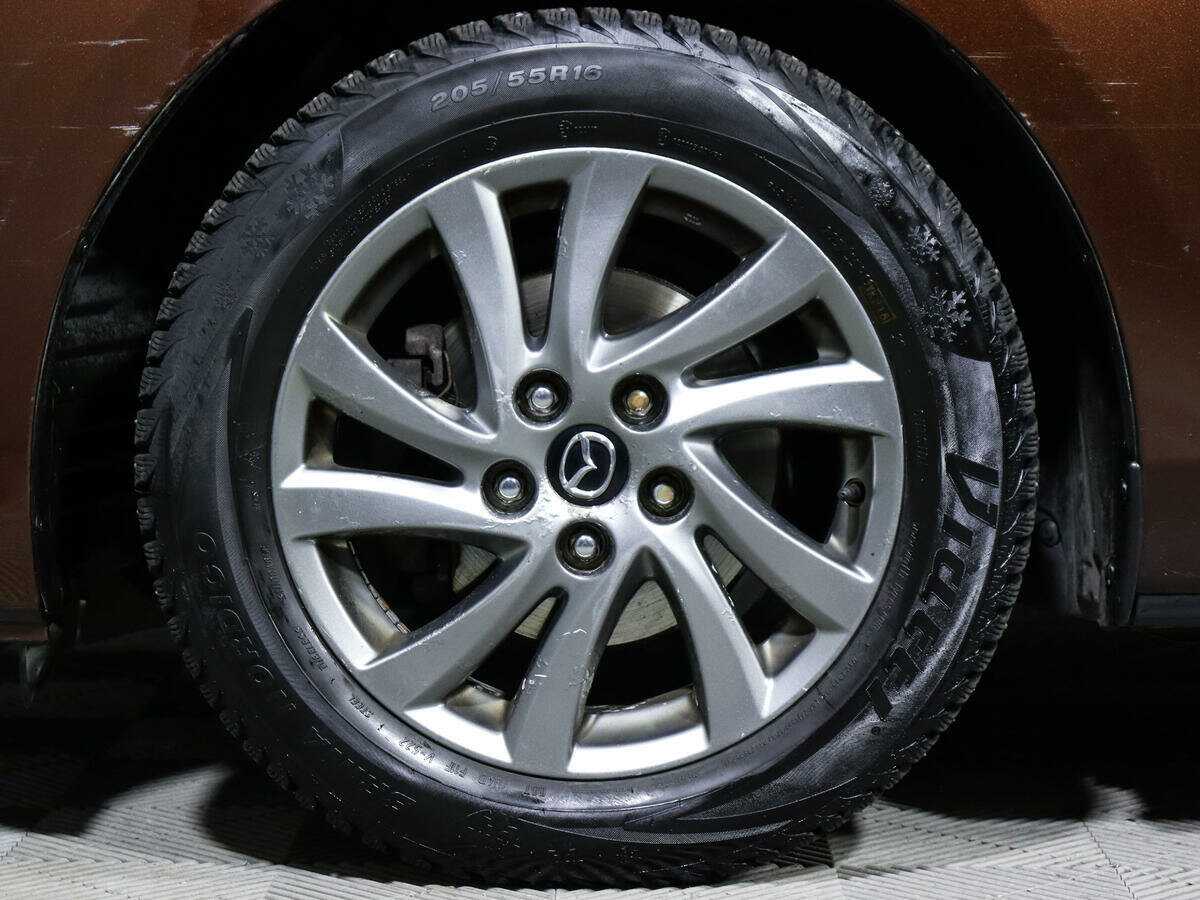 Mazda 3 с пробегом — 2012 год. Фото: #12