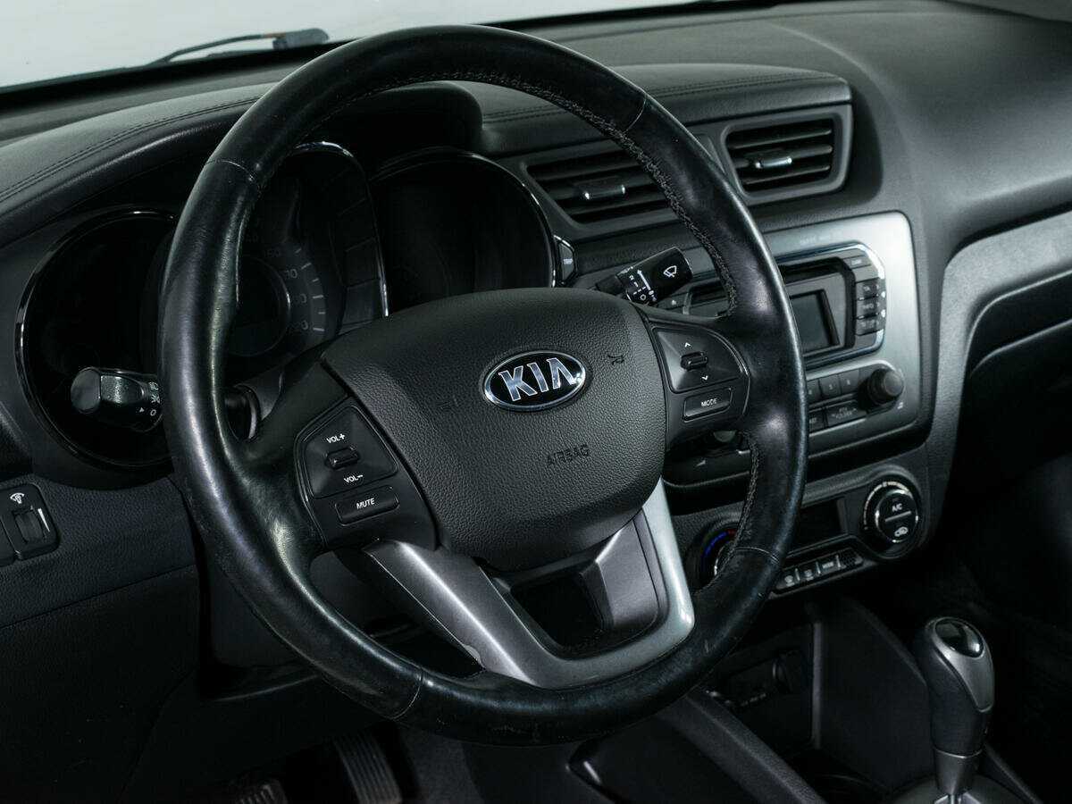 Kia Rio с пробегом — 2013 год. Фото: #12