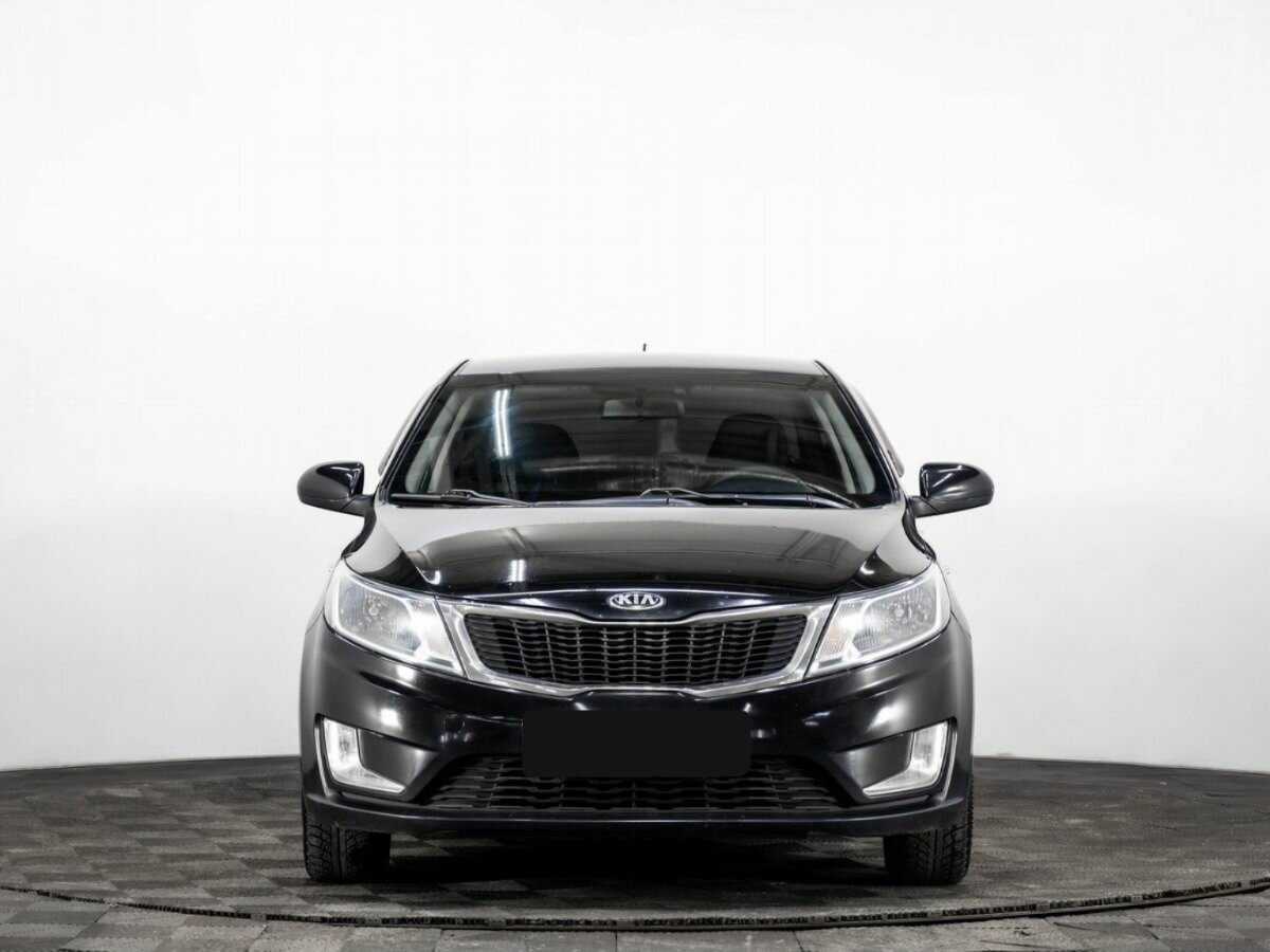 Kia Rio с пробегом — 2013 год. Фото: #1