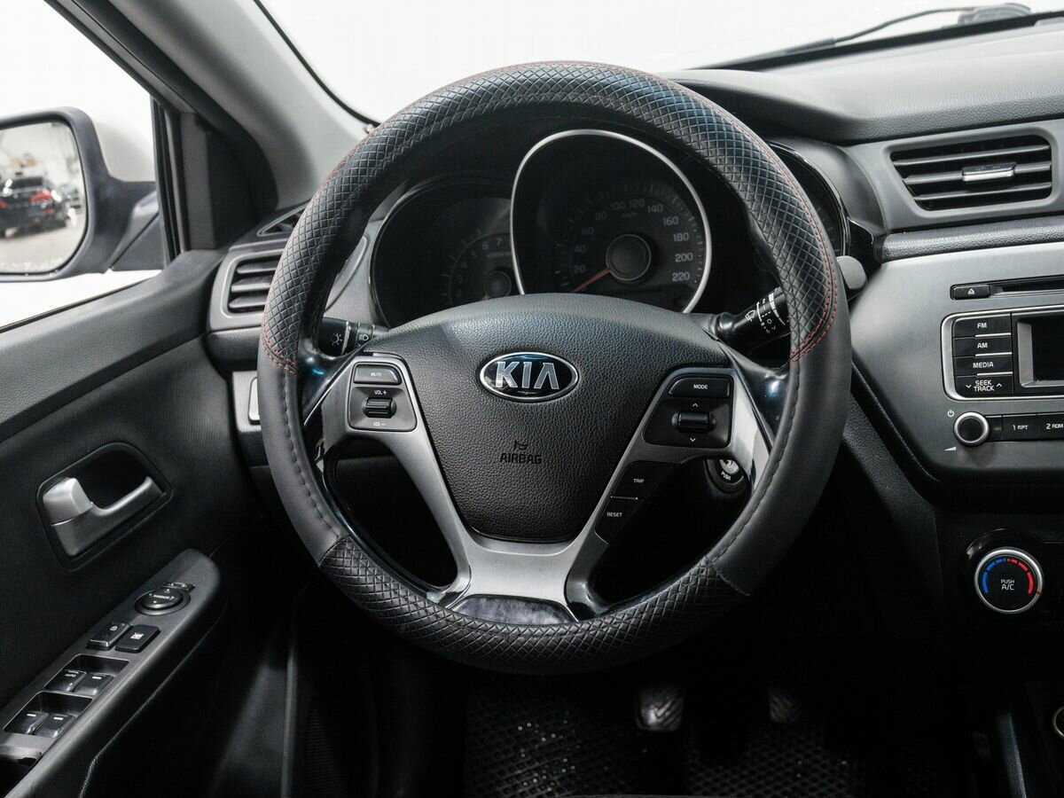 Kia Rio с пробегом — 2015 год. Фото: #11