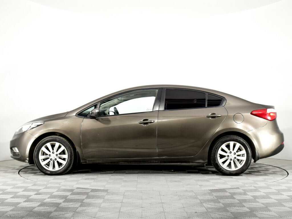 Kia Cerato с пробегом — 2015 год. Фото: #7