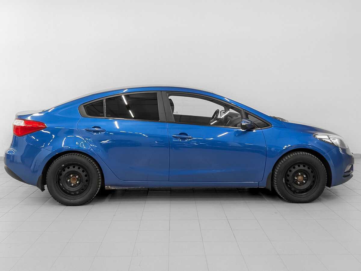 Kia Cerato с пробегом — 2013 год. Фото: #3