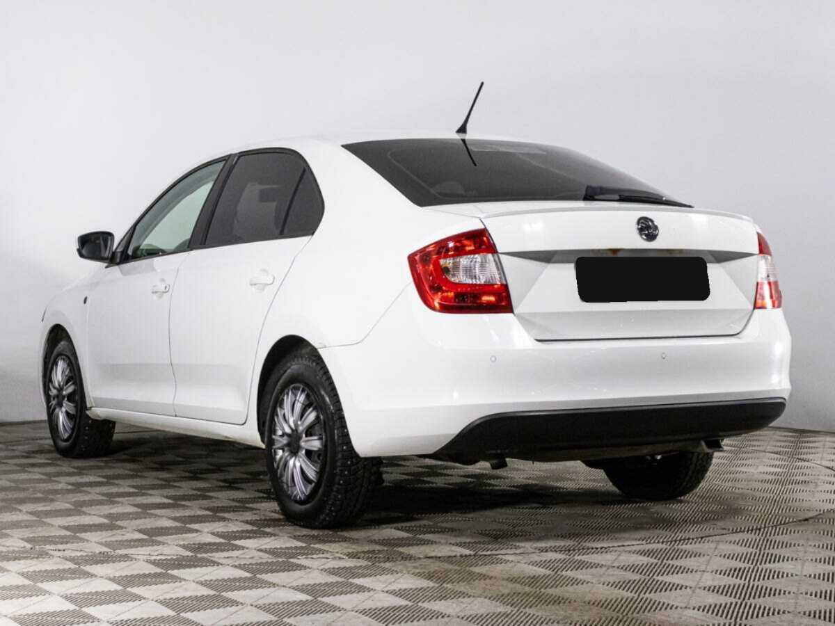 Skoda Rapid с пробегом — 2014 год. Фото: #2