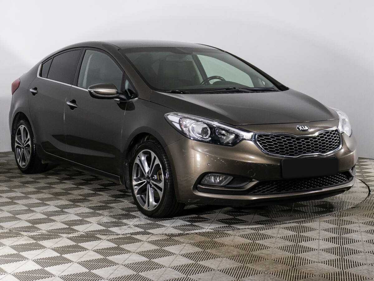 Kia Cerato с пробегом — 2015 год. Фото: #2