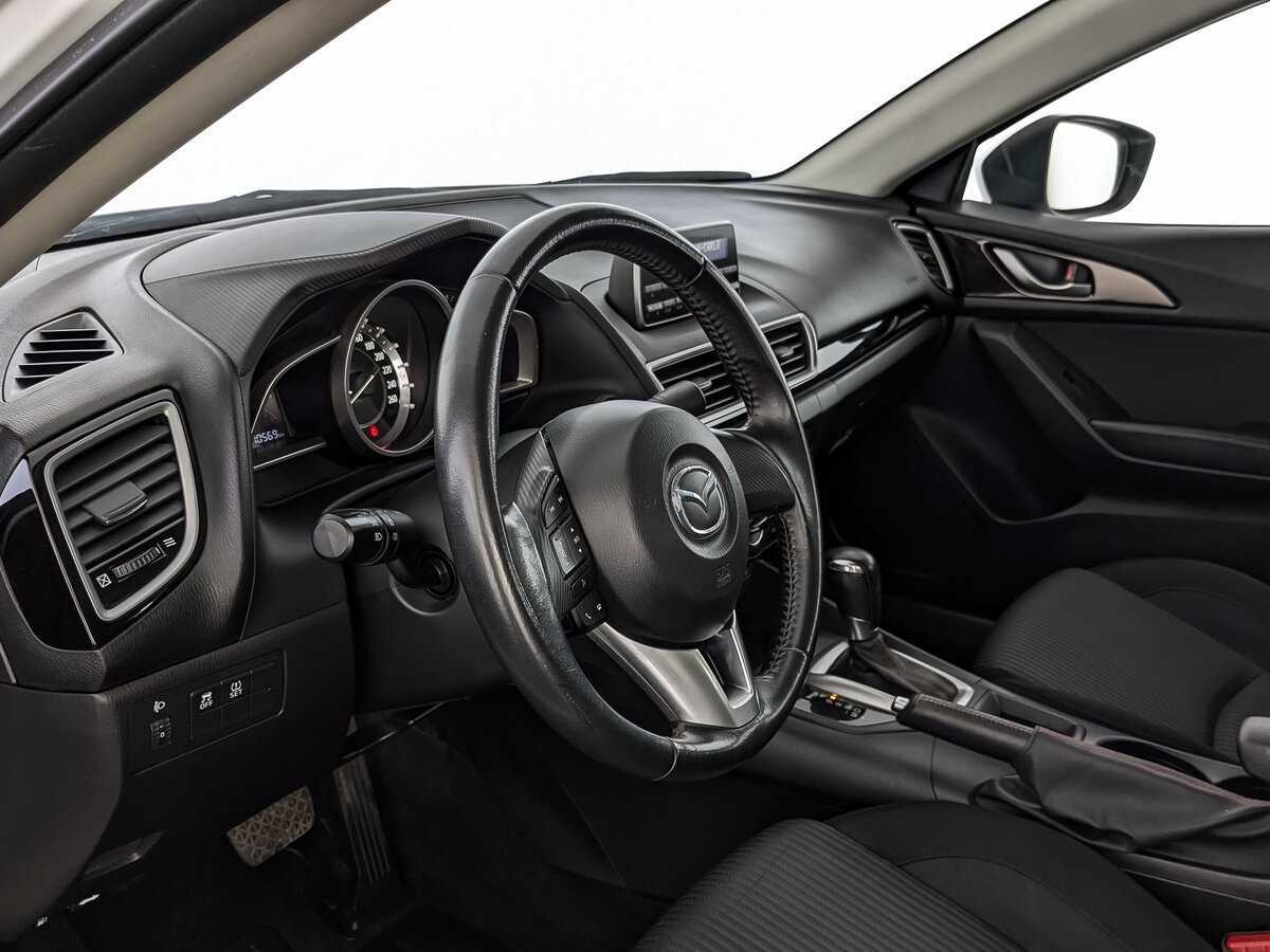 Mazda 3 с пробегом — 2014 год. Фото: #14